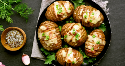 Pommes de terre au barbecue au faux filet de boeuf séché et à la Tomme de Savoie